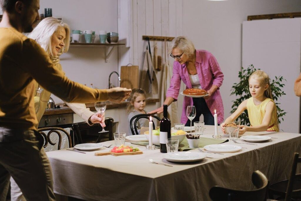 A family enjoying dinner preparation in a custom kitchen