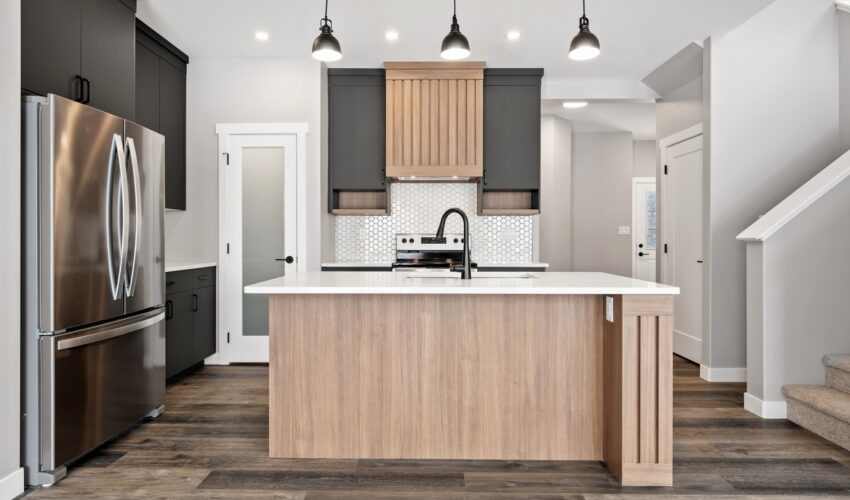 a large kitchen island in a modern kitchen space.