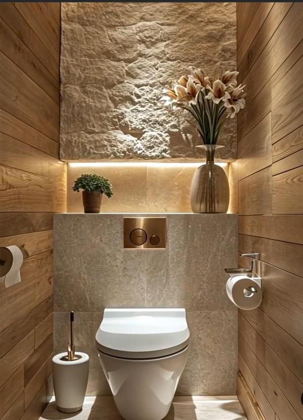 Spa-inspired powder room with wood paneling, stone accents, and wall-mounted toilet