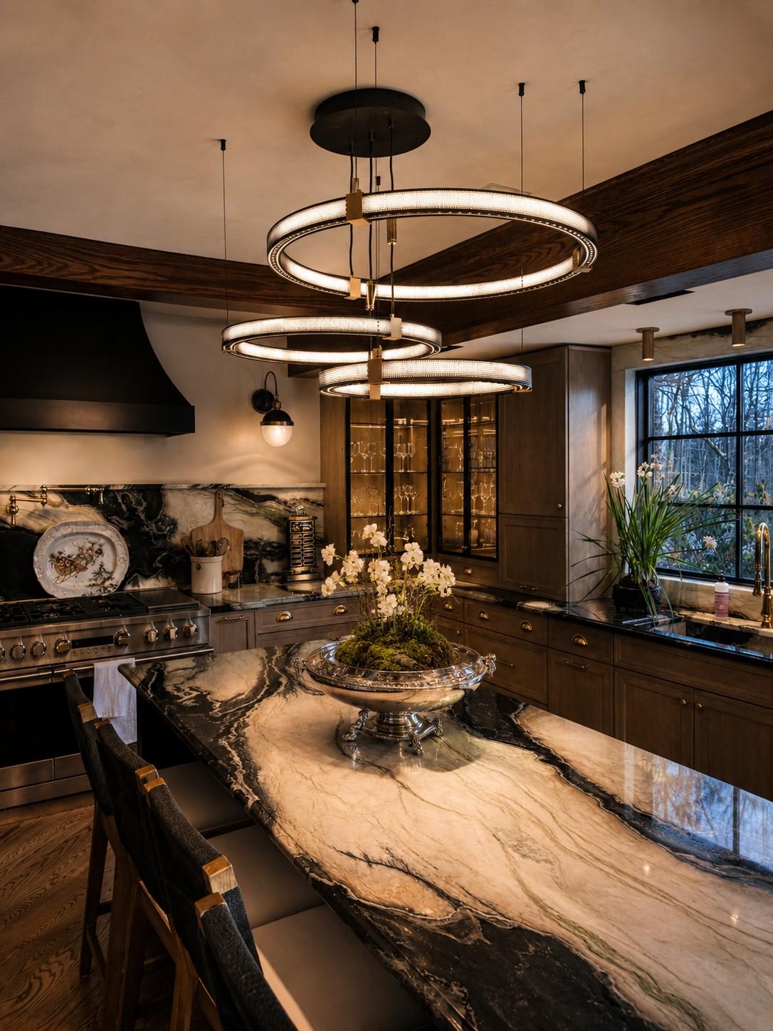 Custom kitchen in a Skytop PA home with beamed ceiling, marble island, and seating for year round entertaining